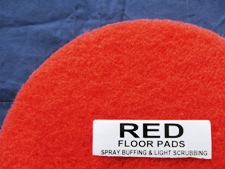 top half of red floor pad, label displayed